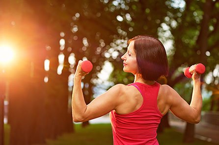 Woman over 40 doing a short home strength workout